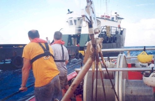 Workboat on visit to chase boat